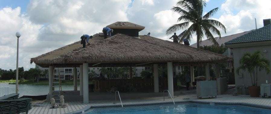 Installing-synthetic-thatch