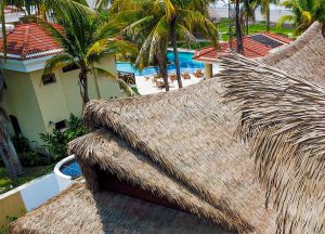 Synthetic palm thatch roof at a resort.