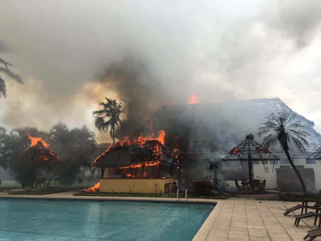 poolside resort thatch roofing material caught in large fire