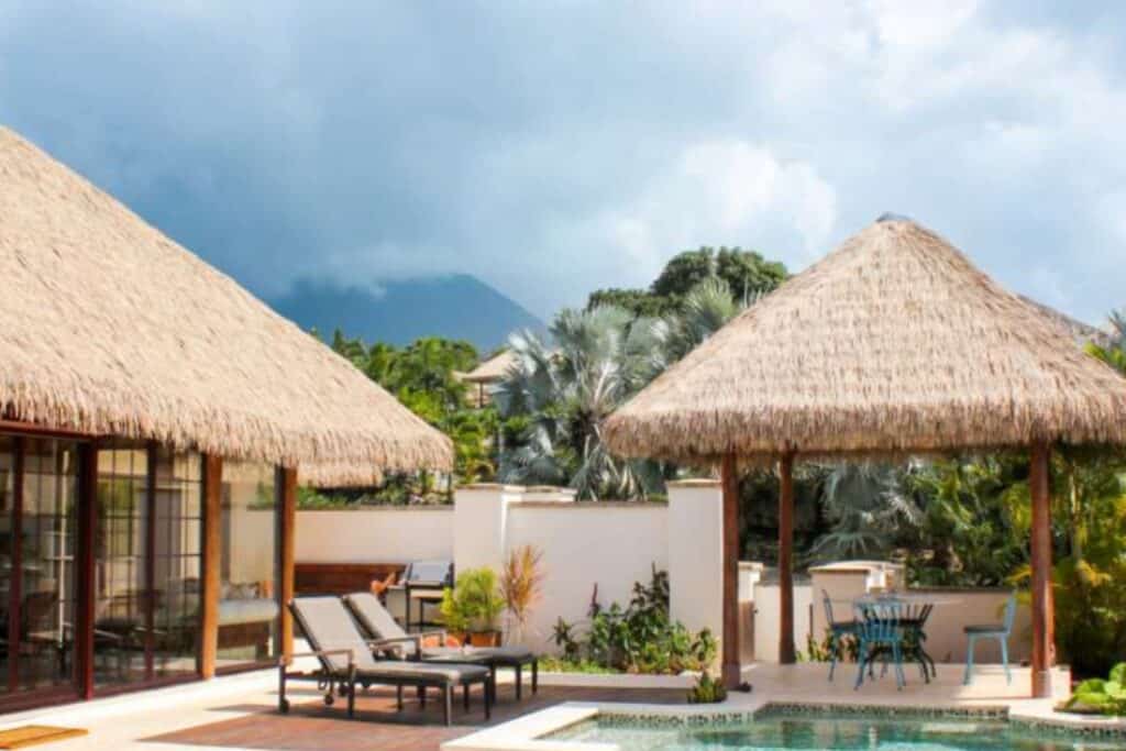 viva palm and engineered thatch on poolside buildings