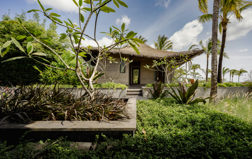 Loro guest cabin Pedasi Panama with Endureed bespoke synthetic thatch roof, custom-blend engineered thatch on low-pitch tropical villa cabin, luxury private estate thatch roofing IMKM Architecture