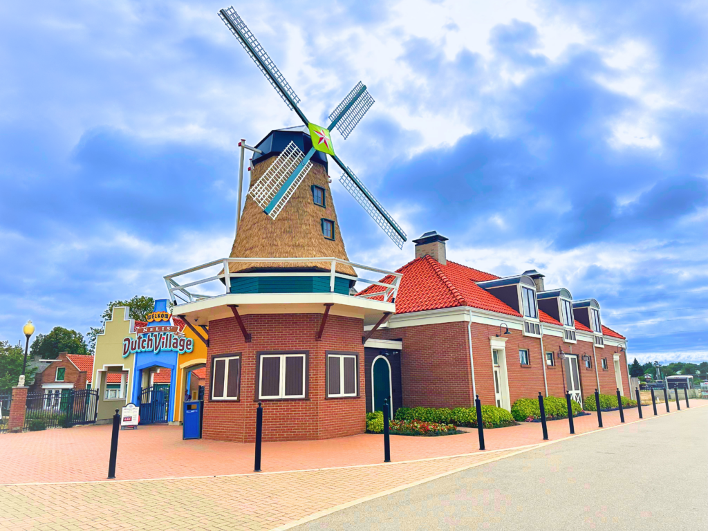 Endureed Somerset engineered thatch on iconic windmill tower at Nelis Dutch Village Holland Michigan, premium synthetic thatch cladding for large-scale theme park and entertainment venue immersive architecture