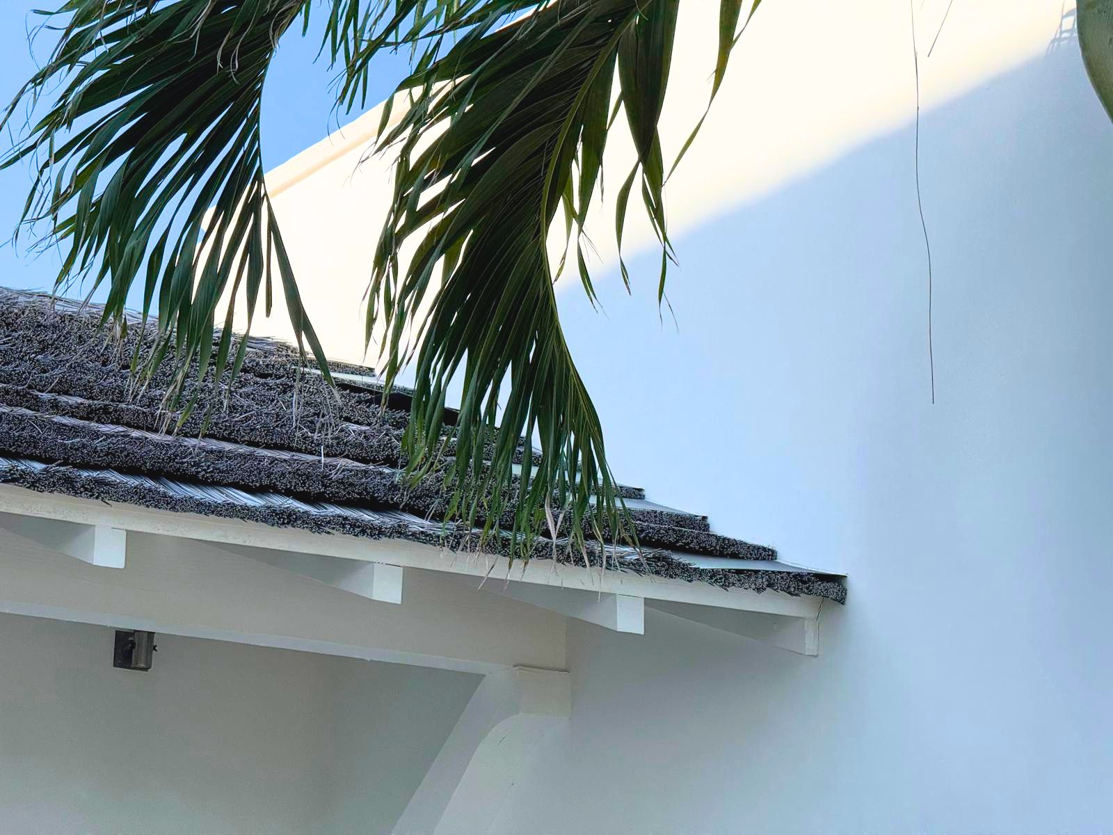 Endureed Kilimanjaro engineered thatch roofing across multiple structures of oceanfront luxury estate with pool, Goat Cay Bahamas