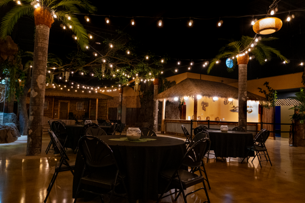 Engineered thatch roof over indoor tiki bar at Florida aquarium wedding venue