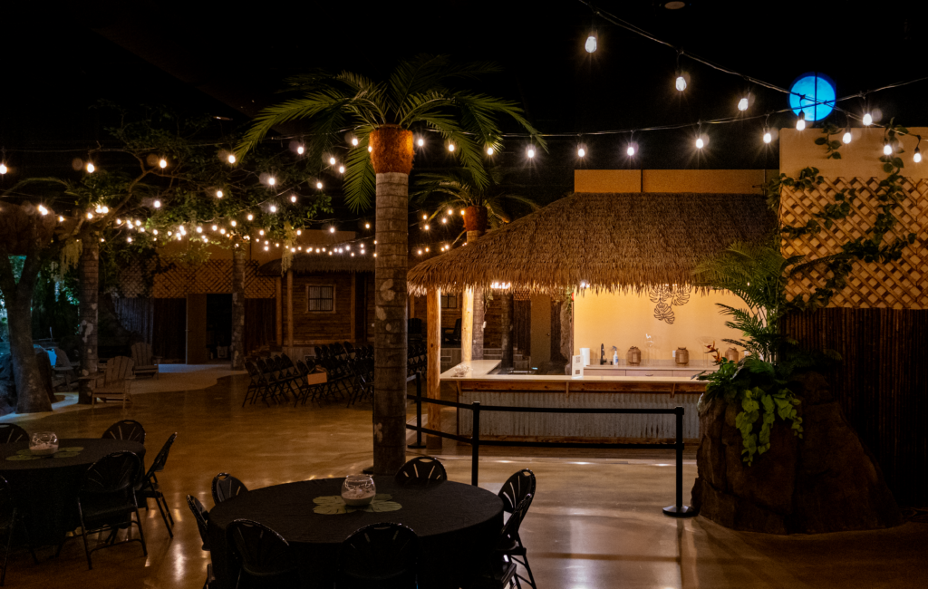 Engineered thatch roof over indoor tiki bar at Florida aquarium wedding venue