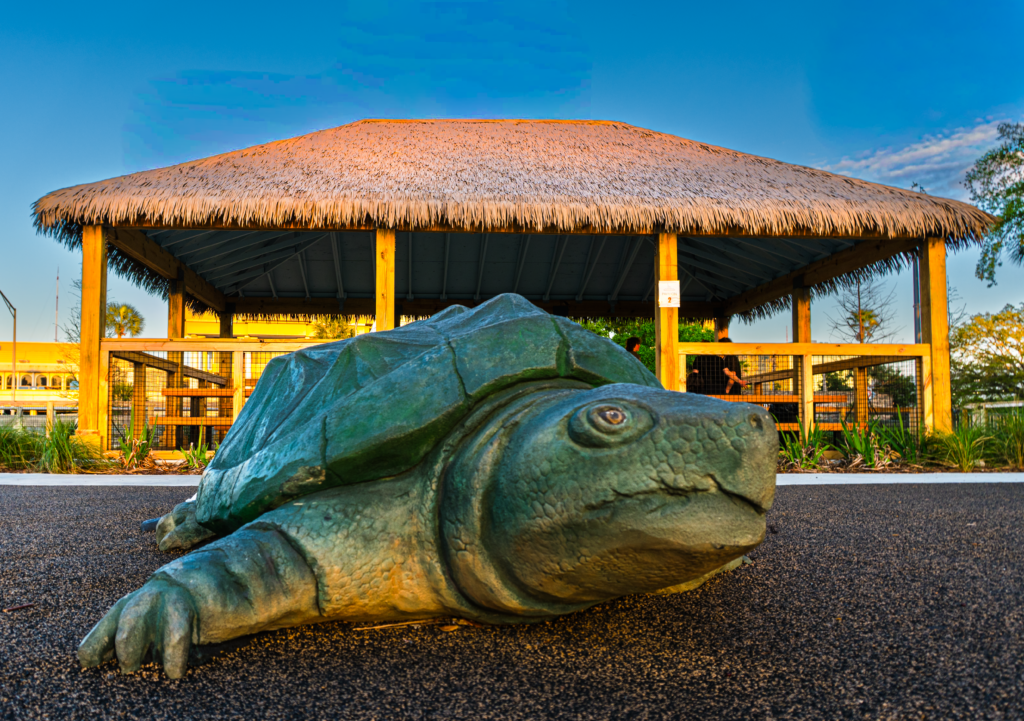 Guests relaxing under Endureed Performance Weathered Palm thatch Friendship Fountain Jacksonville outdoor landmark lifestyle park