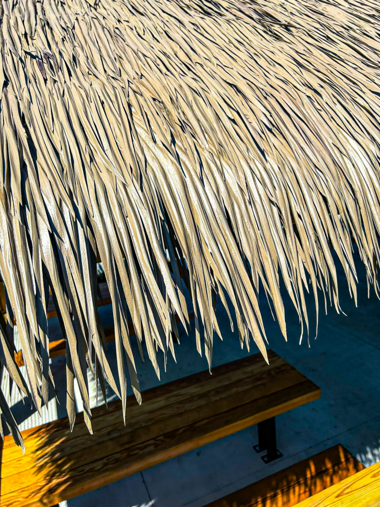 Engineered thatch texture close-up Performance Weathered Palm Endureed public installation Jacksonville FL