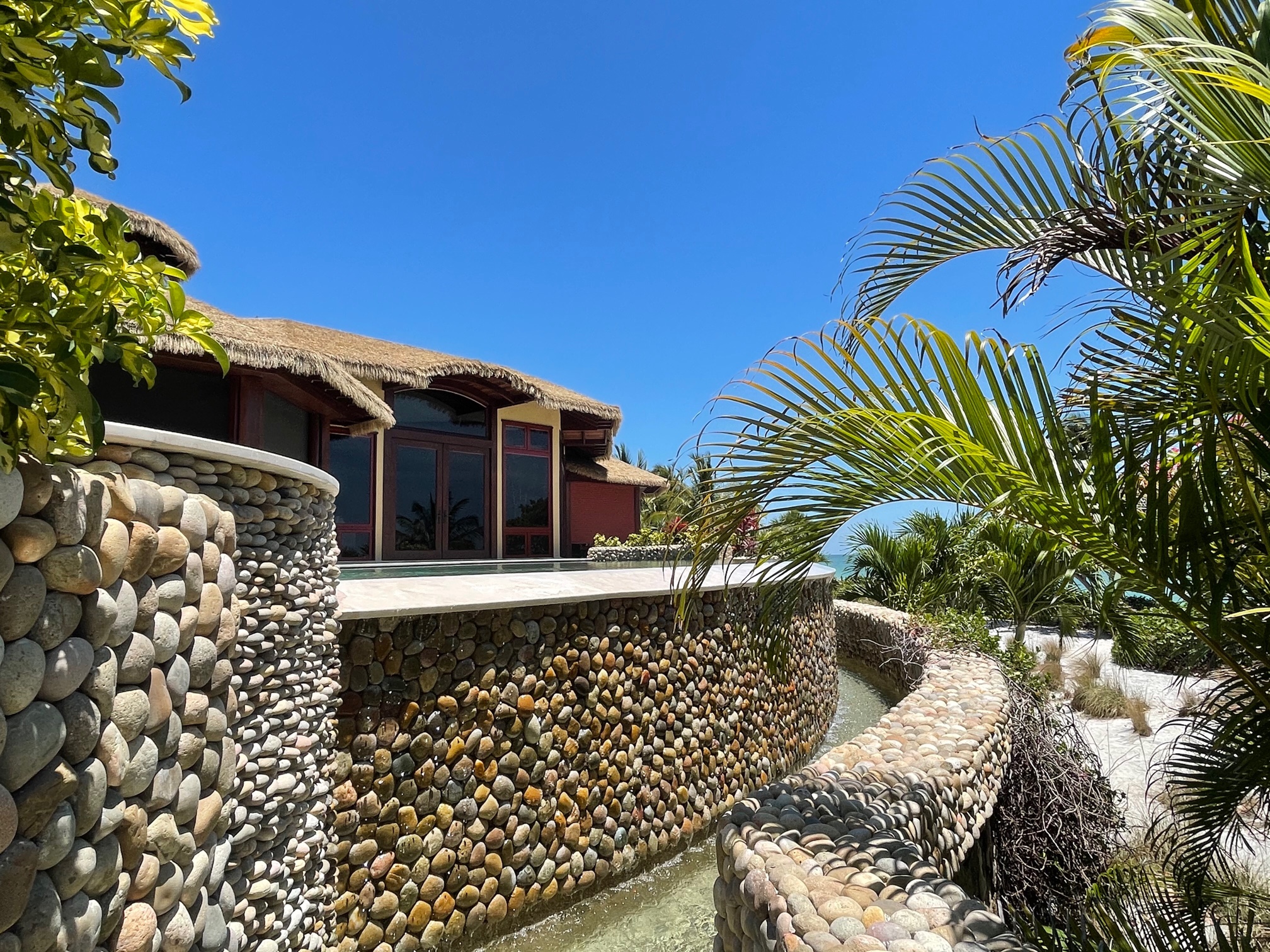 Baum residence on Sanibel Island Florida with Endureed Premium Bali synthetic thatch roof, exterior front view
