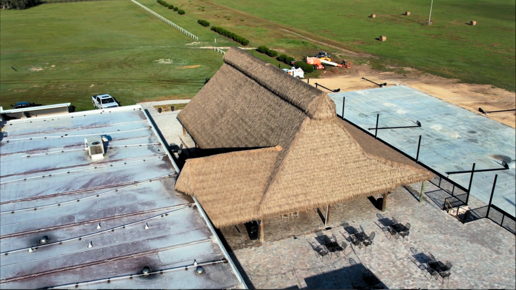 Aerial view of Endureed synthetic thatch roof on Oxford Downs tiki bar structure, Summerfield Florida