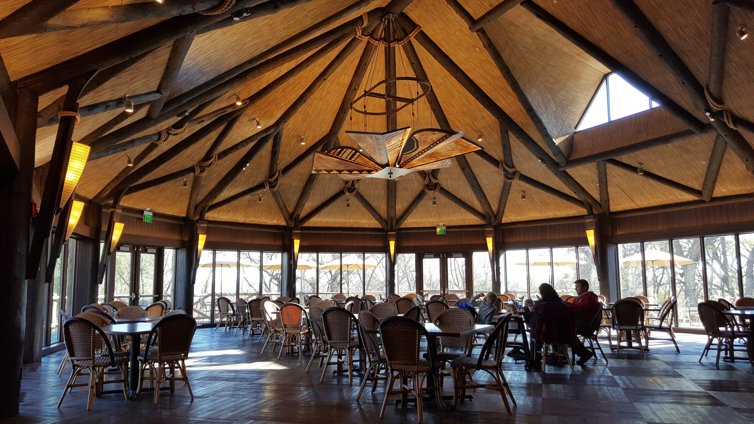 Zoo exhibit building at Omaha Zoo featuring Endureed Premium Capetown engineered thatch, natural setting summer view