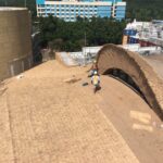 Hong Kong Disney Explorer Lodge Foremen Construct a Rooftop Pitch. Use the roof pitch calculator to figure out your next project.